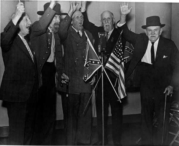 Left to right: W. B. Kidd, age 84; T. N. Alexander, age 92; D. W. Mayes, age 91; H. C. Irwin, age 90; J. E. Porter, age 96 Photo : Confederate Veterans, Charlotteer, December 1937, Charles H. Crutchfield collection, Robinson-Spangler Carolina Room Photo: Charles H. Crutchfield, Charles H. Crutchfield collection, Robinson-Spangler Carolina Room Five Confederate veterans from Mecklenburg Camp 382, who performed the Rebel yell live on WBT radio, Charlotte, NC.