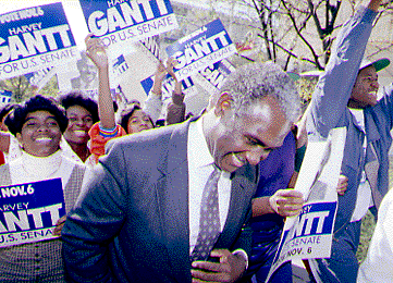 Gantt celebrates his victory with supporters.