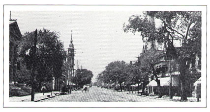 1903 view of North Tryon Street. New Carnegie Library at extreme left.