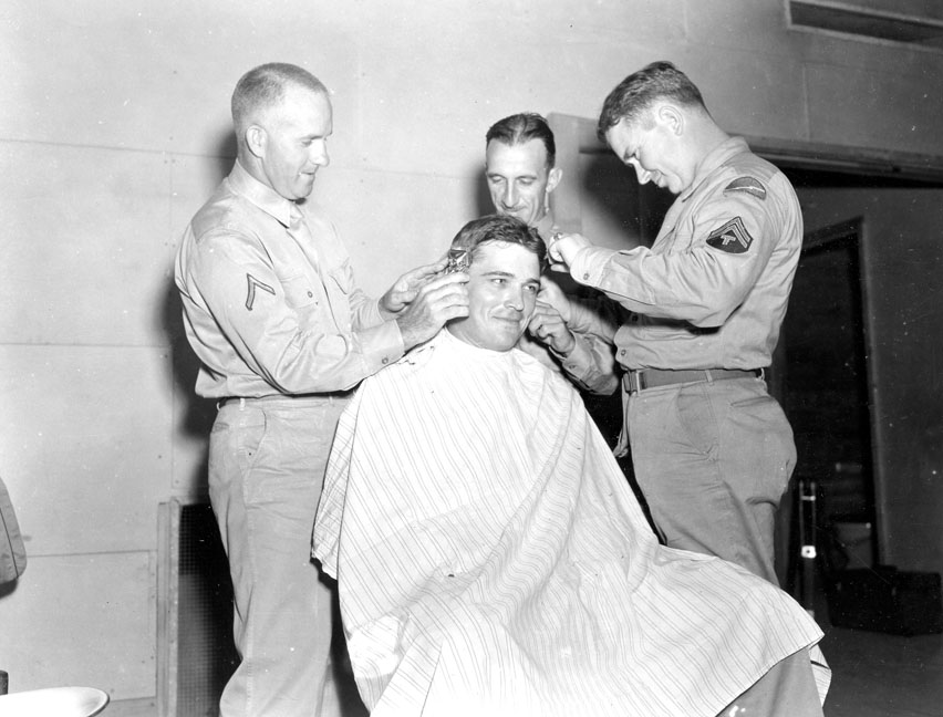 "Soldiers learning to be barbers, Camp Butner, N.C."