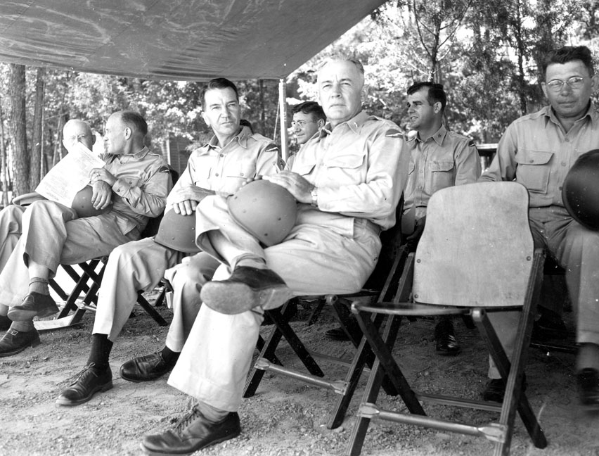 "Field Meet-Aug 14, 1943, 78th Div. Camp Butner, N.C. Vacant chair was for Libby! [Don's wife]" 