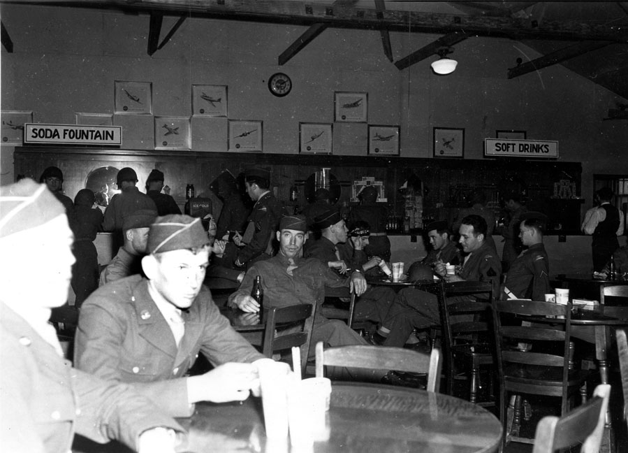 "Typical Scene in Main P.X., Camp Butner, N.C., June 1943" 