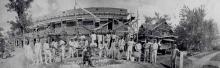 Caldwell W. Phifer, a prominent contractor, poses with his crew at the Caswell Apartments construction site on September 29, 1927. PLCMC.