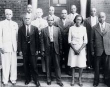 World War II Rationing Board, Colored Section. Left to right, front row: Arthur E. Grier, R. P. Wilson, Dr. Nathaniel S. Tross, Adelaide Hunt, Henry Houston. Second row: Thad L. Tate, Clarence Moreland, Jesse Bowser. Back row: Fred Alexander, Dr. Thomas Watkins, Clinton L. Blake, c. 1942. LAURA M. BOOTON.