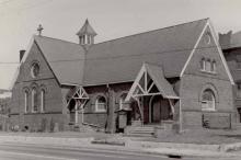 St. Michael and All Angels Protestant Episcopal Church was established in 1882 and this building was completed the following year on South Mint Street at West Hill Street in Third Ward. PLCMC.