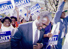Gantt celebrates his victory with supporters.
