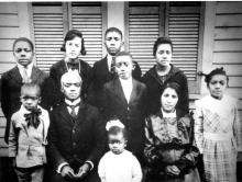 The Reverend C. H. Shute family, c. 1921. Left to right, front row: Matthew, the Reverend Charles Henry, Mary, Marlow, Annie Foster Shute, Esther. Back row: Raymond, Vivian, Charles Jr., Ionia. MATTHEW SHUTE.