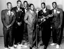 The Golden Bells Quintet, 1944. Left to right: James Maxwell, Lendy Mackie, Louis Samuel, James McLilly and Boyce Clinton. At the microphone is manager Ned Davis. KENNETH VINSON.