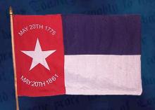 A replica of a Civil War era North Carolina flag.