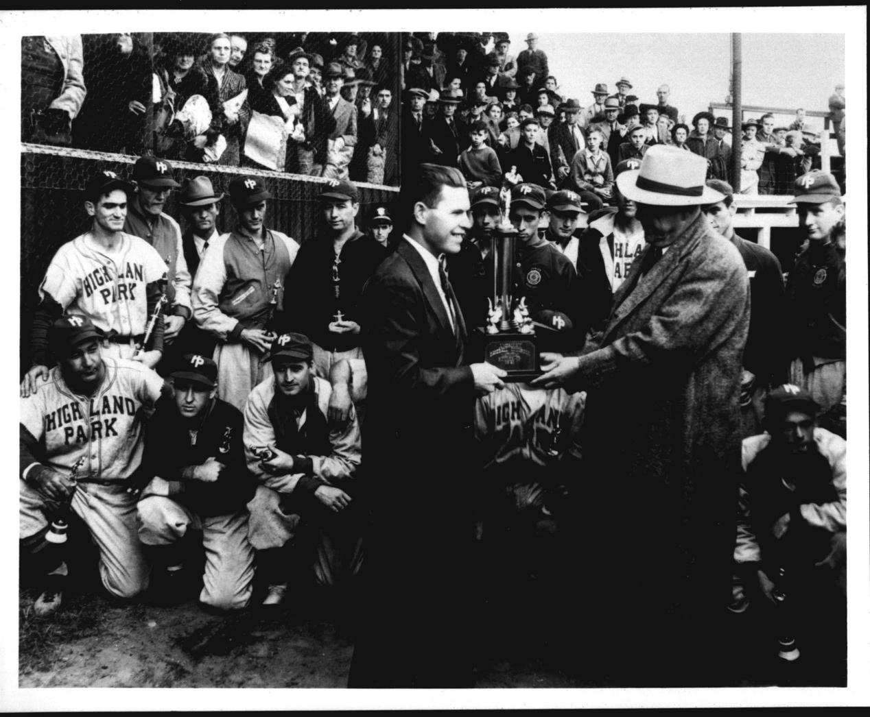 Luther Brackett began working at the Highland Mill Park #3 in 1934. He started as a trainee, but eventually became the General Manager of the mill until it closed in 1969. Brackett accepted, on behalf of the Highland Park baseball team, a trophy for placing second in the 1941 National Amateur World Series in Battle Creek, Michigan.