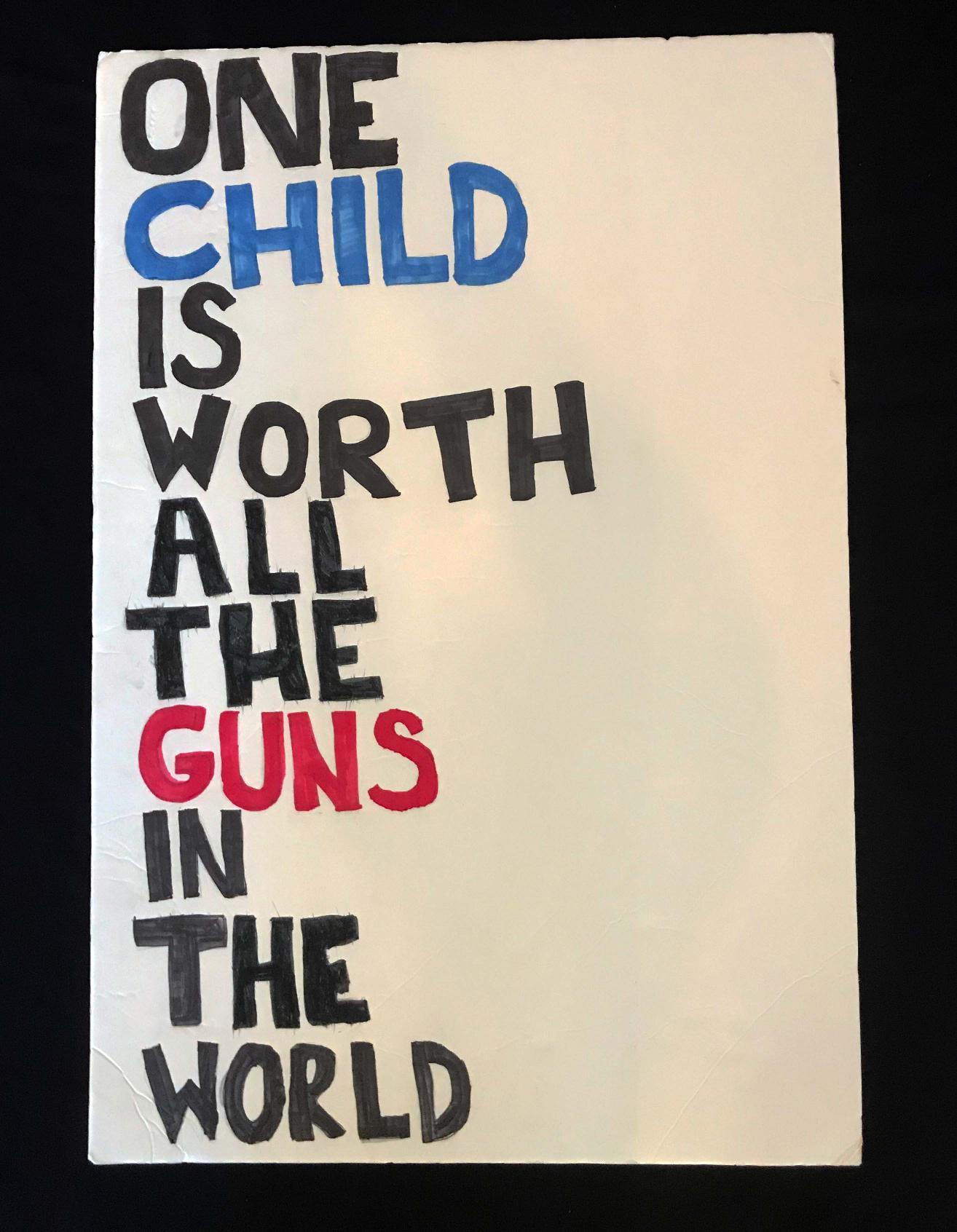 Charlotte March for Our Lives, 2018. Sign reads: "One child is worth all the guns in the world."