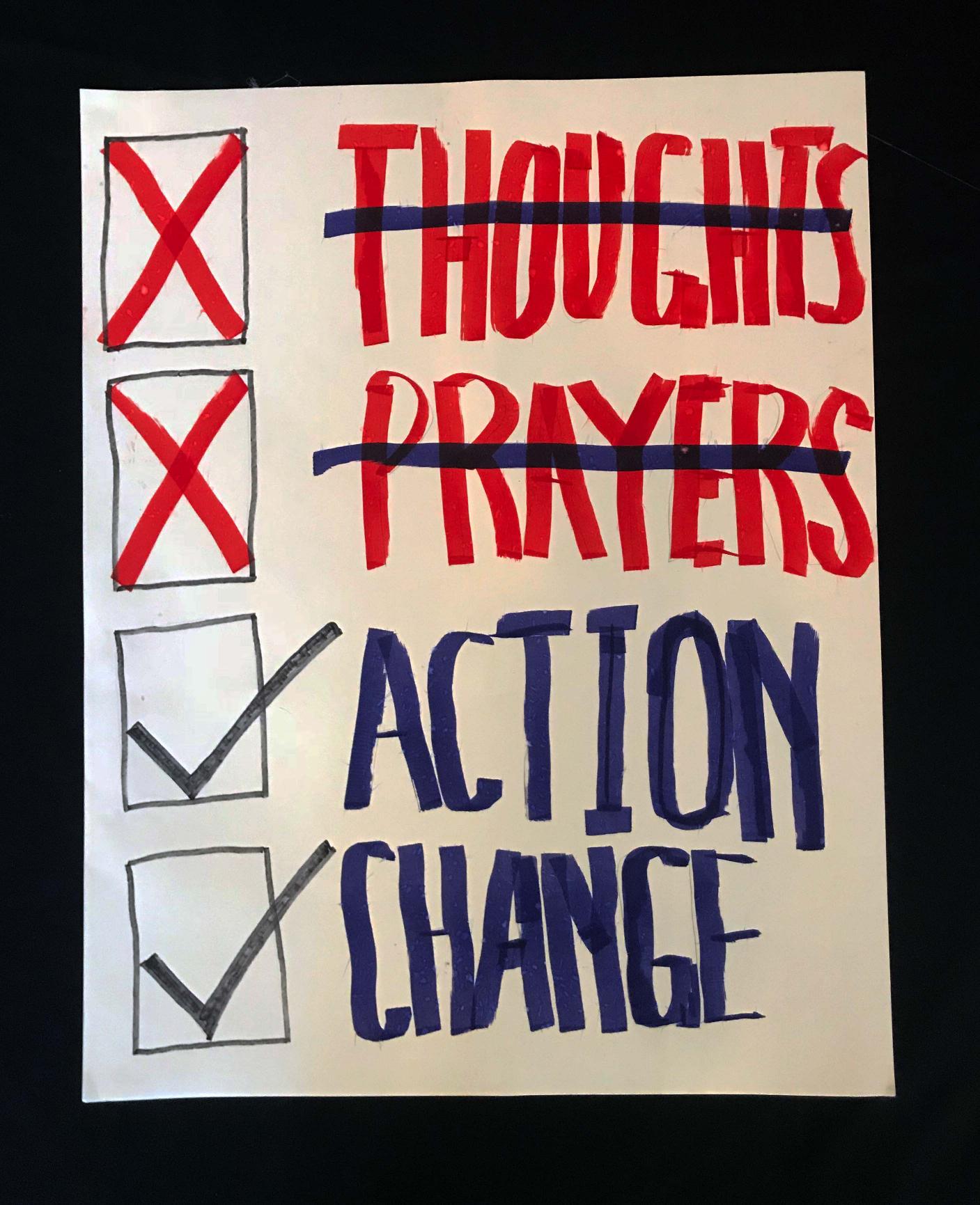 Charlotte March for Our Lives, 2018. Sign reads: "[Not] Thoughts [Not] Prayers [Yes] Action [Yes] Change"